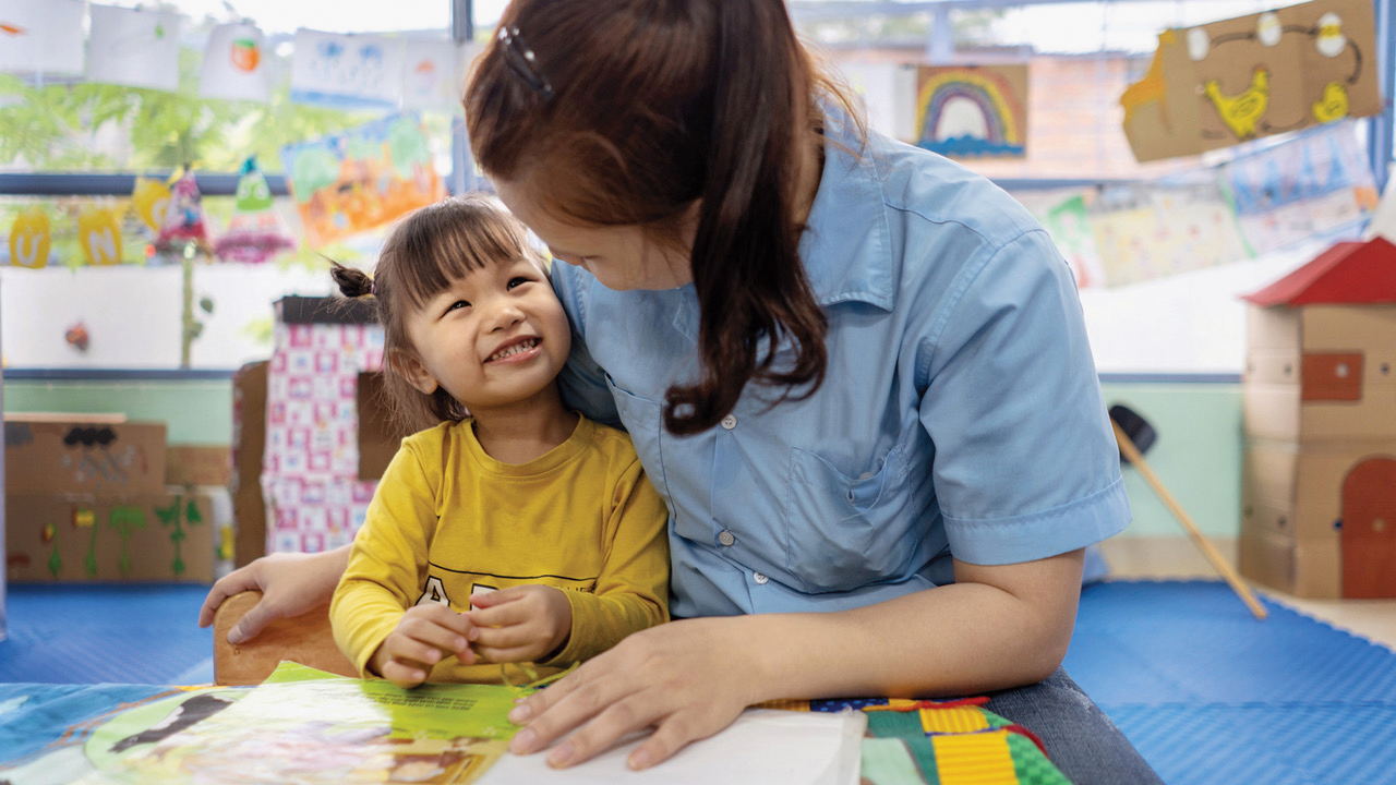Teacher and child at OneSky Early Learning Centre in Vietnam