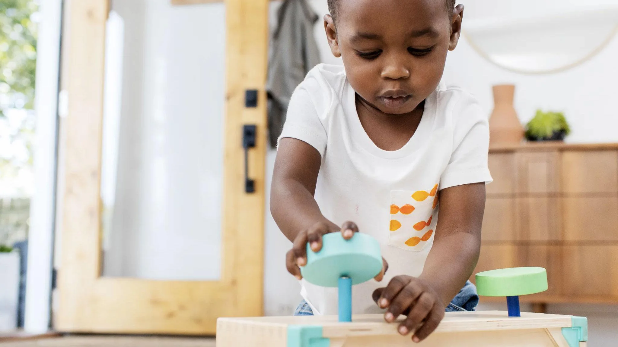 child playing with toys